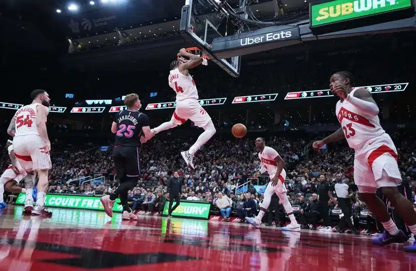 Toronto Raptors forward Scottie Barnes (4) scores a basket.