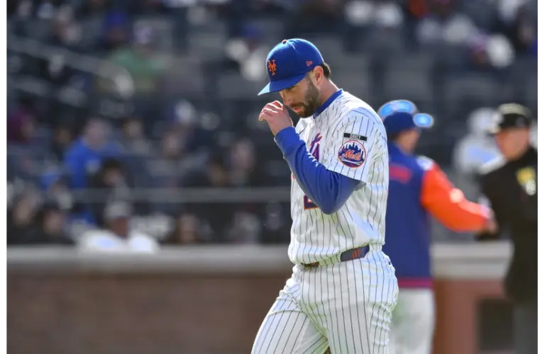 Mets starter David Peterson walks off the mound