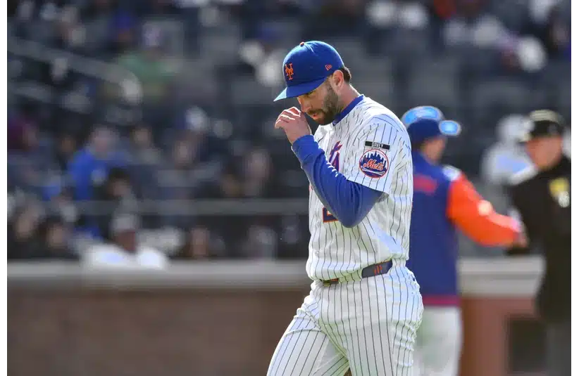 Mets starter David Peterson walks off the mound