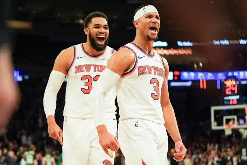 Apr 9, 2026; New York, New York, USA; New York Knicks center Karl-Anthony Towns (32) celebrates with New York Knicks guard Josh Hart (3) after Hart hit a three pointer late in the fourth quarter against the Boston Celtics at Madison Square Garden.