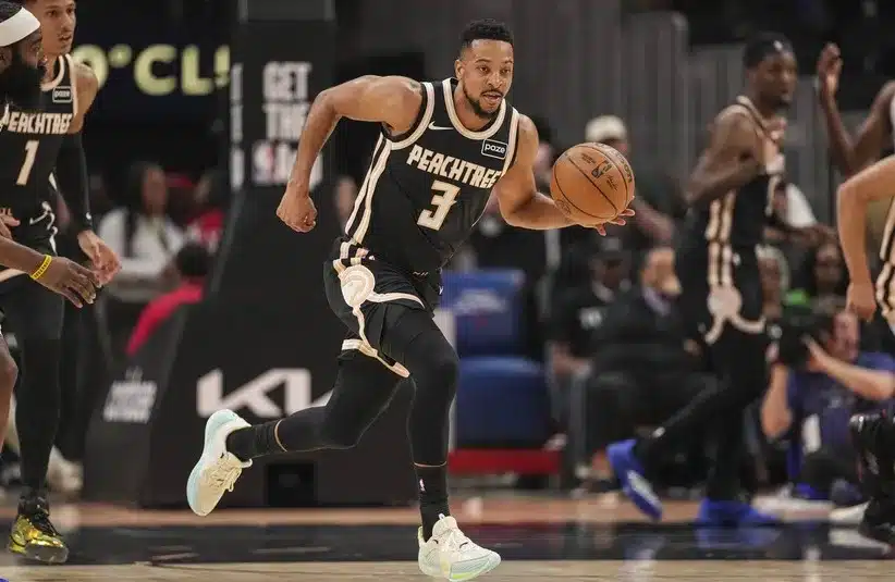 Atlanta Hawks guard CJ McCollum (3) brings the ball up the floor.