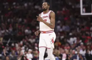 Houston Rockets forward Kevin Durant (7) reacts after scoring.