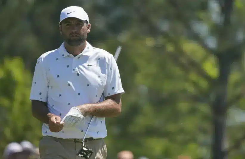 Scottie Scheffler walks the third green.