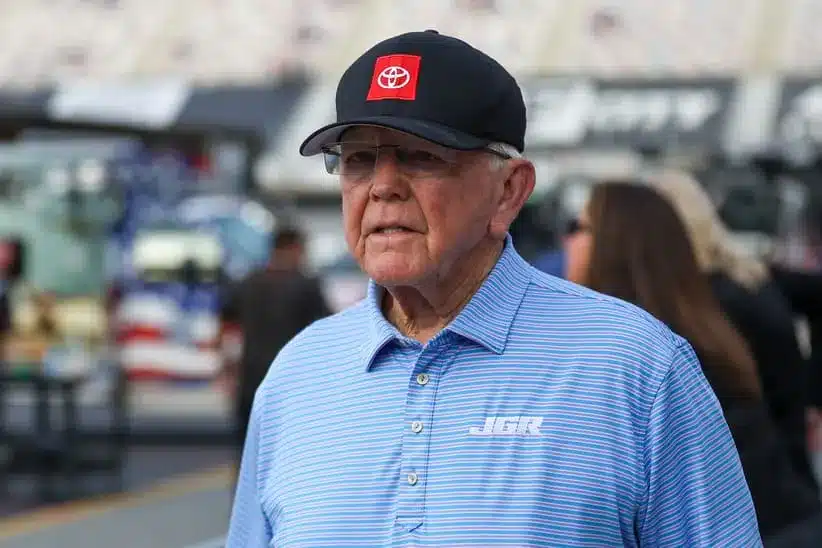 Apr 12, 2026; Bristol, Tennessee, USA; Car owner Joe Gibbs walks to victory lane after his grandson Joe Gibbs Racing driver Ty Gibbs (54) won the race at Bristol Motor Speedway.