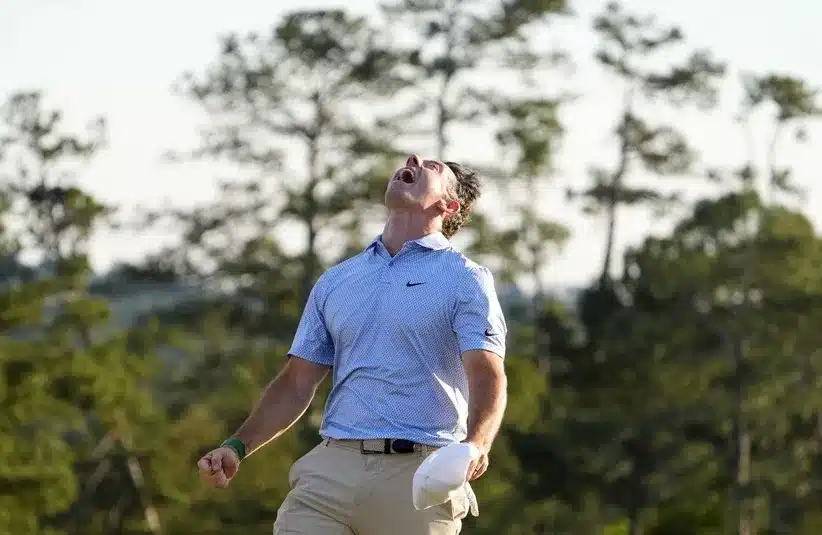 Rory McIlroy celebrates after winning the Masters Tournament.