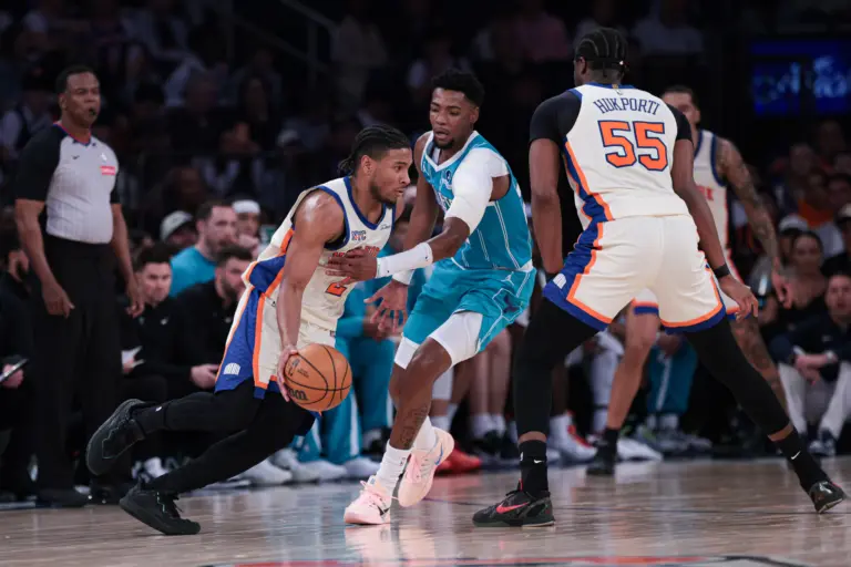 Apr 12, 2026; New York, New York, USA; New York Knicks guard Miles McBride (2) is guarded by Charlotte Hornets forward Brandon Miller (24) during the first half at Madison Square Garden. Mandatory Credit: Vincent Carchietta-Imagn Images