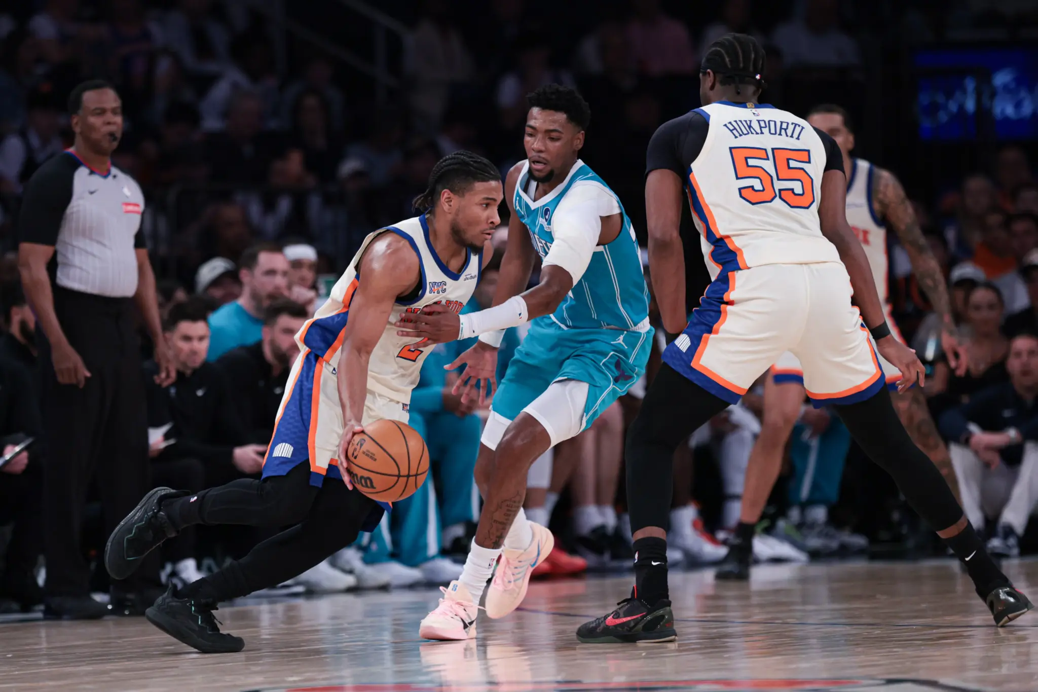 Apr 12, 2026; New York, New York, USA; New York Knicks guard Miles McBride (2) is guarded by Charlotte Hornets forward Brandon Miller (24) during the first half at Madison Square Garden. Mandatory Credit: Vincent Carchietta-Imagn Images
