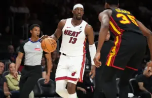 Miami heat forward Bam Adebayo (13) dribbles.