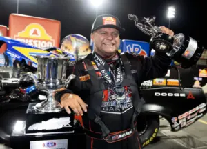 Apr 12, 2026; Pomona, CA, USA; NHRA top fuel driver funny car driver Matt Hagan celebrates after winning the Winternationals at In-N-Out Burger Pomona Dragstrip.