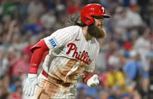 Philadelphia Phillies center fielder Brandon Marsh (16) watches his two RBI double.