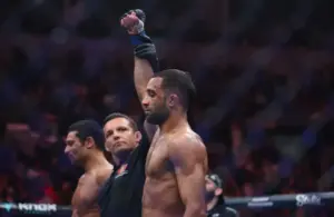 ; Jai Herbert (blue gloves) reacts after defeating Mandel Nallo (red gloves)