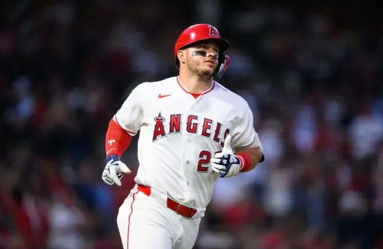 Los Angeles Angels center fielder Mike Trout (27) runs during the third inning.