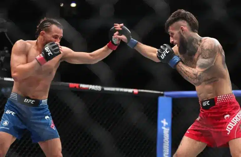 Kyler Phillips (red gloves) fights Charles Jourdain (blue gloves) during UFC Fight Night