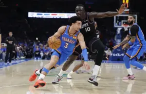 Oklahoma City Thunder guard Jared McCain (3) drives.