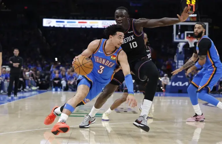 Oklahoma City Thunder guard Jared McCain (3) drives.