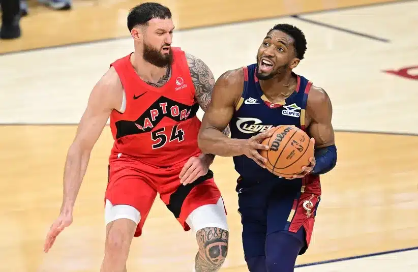 Cleveland Cavaliers guard Donovan Mitchell (45) drives.