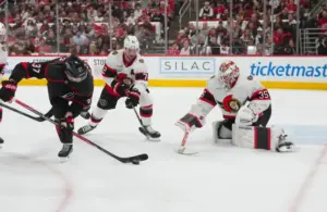 Carolina Hurricanes right wing Andrei Svechnikov (37) tries to control the puck.