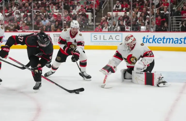 Carolina Hurricanes right wing Andrei Svechnikov (37) tries to control the puck.