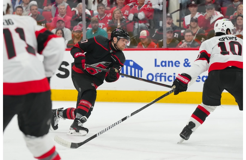 Apr 20, 2026; Raleigh, North Carolina, USA; Carolina Hurricanes left wing Nikolaj Ehlers (27) takes a shot against the Ottawa Senators during the first period in game two of the first round of the 2026 Stanley Cup Playoffs at Lenovo Center. Mandatory Credit: James Guillory-Imagn Images