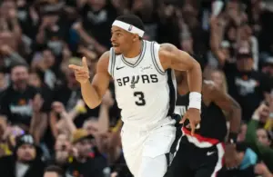 San Antonio Spurs forward Keldon Johnson (3) reacts after scoring.