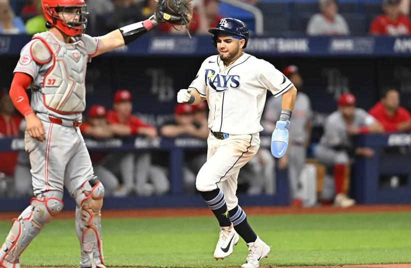 Tampa Bay Rays infielder Jonathan Aranda (8) runs home.