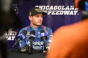 Two-time NASCAR champion Kyle Larson speaks with reporters during a break in the Goodyear tire test Wednesday, April 22, 2026, at Chicagoland Speedway in Joliet, Illinois.