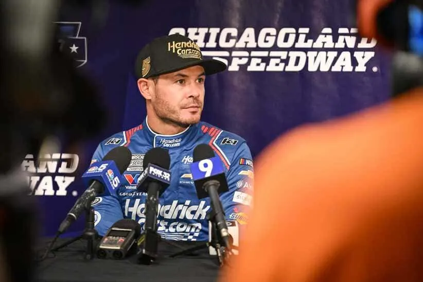 Two-time NASCAR champion Kyle Larson speaks with reporters during a break in the Goodyear tire test Wednesday, April 22, 2026, at Chicagoland Speedway in Joliet, Illinois.