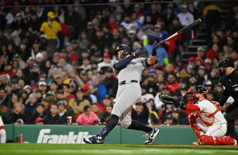 New York Yankees right fielder Aaron Judge (99) hits a single.