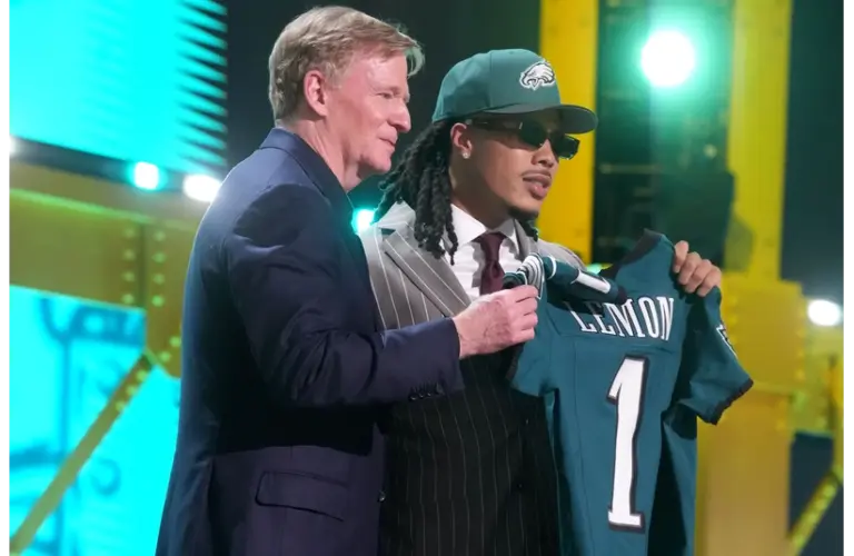 Makai Lemon with Roger Goodell holding up his new Philadelphia Eagles jersey