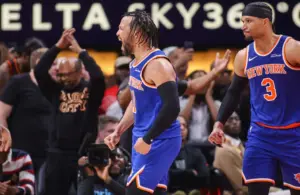 New York Knicks guard Jalen Brunson (11) reacts after a basket.
