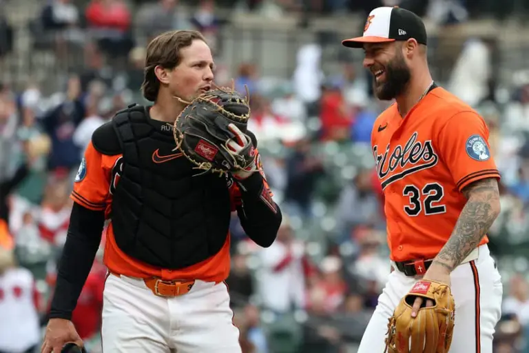Apr 25, 2026; Baltimore, Maryland, USA; Baltimore Orioles catcher Adley Rutschman (35) speaks with Baltimore Orioles left fielder Weston Wilson (32) during the ninth inning against the Boston Red Sox at Oriole Park at Camden Yards.
