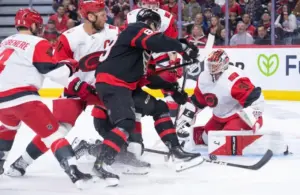 Ottawa Senators center Lars Eller (89) seizes the opportunity to capitalize on a rebound by Carolina Hurricanes goalie Frederik Andersen (31).