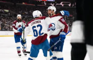 Colorado Avalanche center Nicolas Roy (10) is greeted by teammates after scoring during the third period.