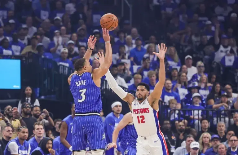 Orlando Magic guard Desmond Bane (3) shoots a three point basket.