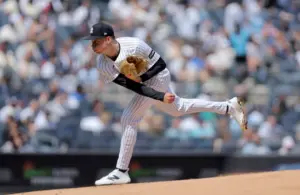 Apr 18, 2026; Bronx, New York, USA; New York Yankees starting pitcher Will Warren (29) follows through on a pitch against the Kansas City Royals during the first inning at Yankee Stadium.