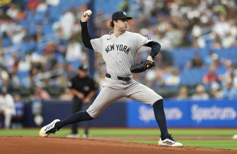 Apr 12, 2026; St. Petersburg, Florida, USA; New York Yankees starting pitcher Cam Schlittler (31) throws a pitch against the Tampa Bay Rays in the first inning at Tropicana Field.