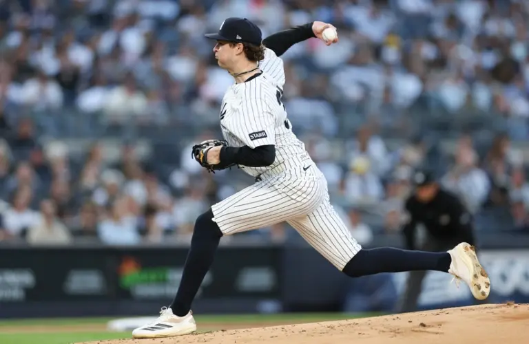Apr 17, 2026; Bronx, New York, USA; New York Yankees pitcher Cam Schlittler (31) delivers a pitch during the first inning against the Kansas City Royals at Yankee Stadium.