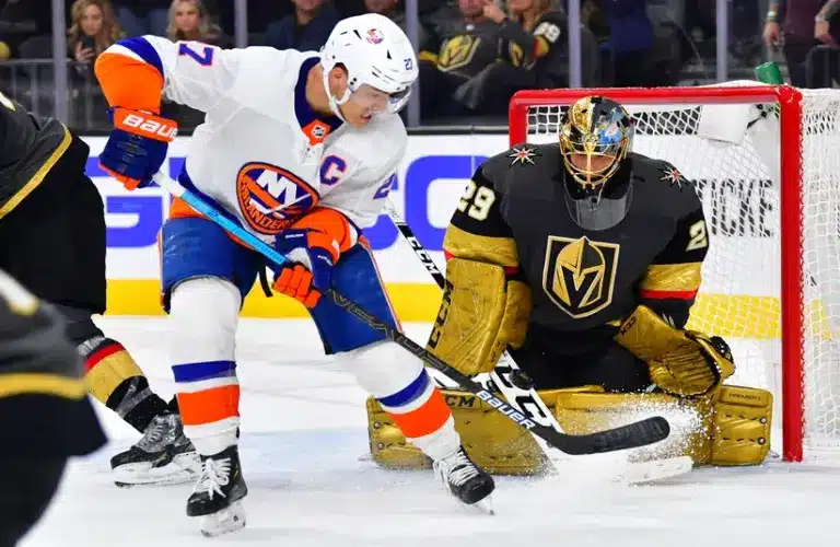 Feb 15, 2020; Las Vegas, Nevada, USA; Vegas Golden Knights goaltender Marc-Andre Fleury (29) makes a third period save against New York Islanders left wing Anders Lee (27) at T-Mobile Arena.
