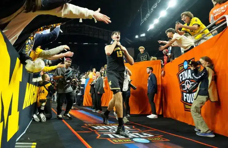 Apr 4, 2026; Indianapolis, IN, USA; Michigan Wolverines center Aday Mara (15) greets fans after their win against the Arizona Wildcats in a semifinal of the Final Four of the men's 2026 NCAA Tournament at Lucas Oil Stadium.