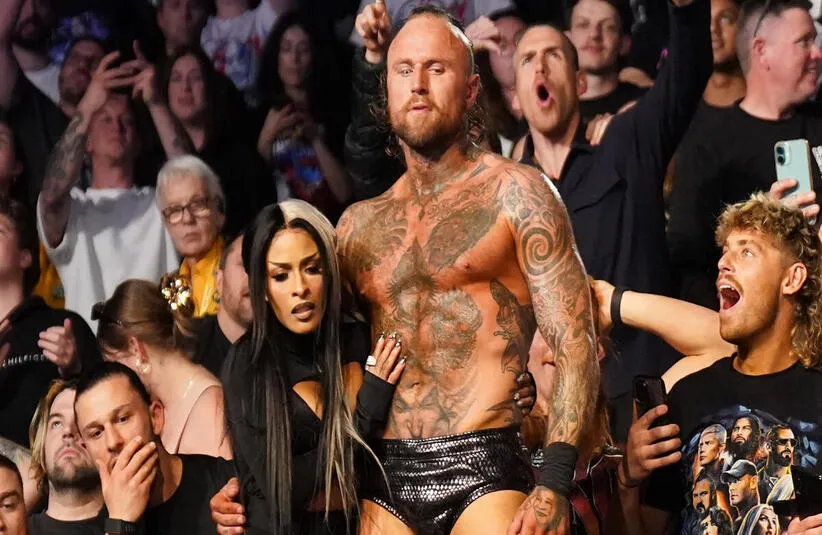 Aleister Black And Zelina Vega Hugging In WWE Crowd