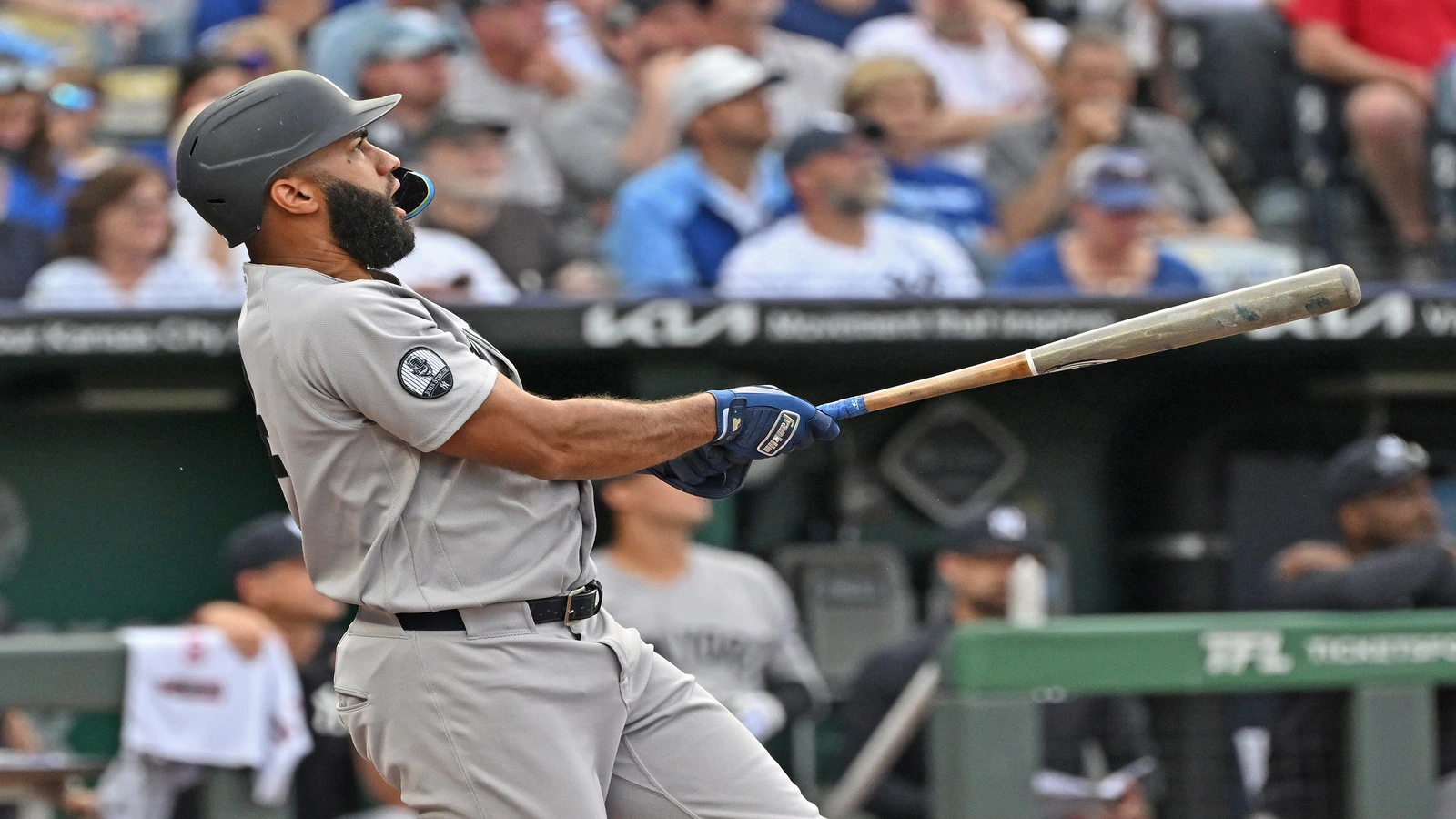 May 26, 2026; Kansas City, Missouri, USA; New York Yankees third baseman Amed Rosario (14) hits a two-run home run in the first inning against the Kansas City Royals at Kauffman Stadium.