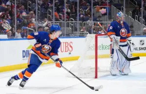 Apr 12, 2026; Elmont, New York, USA; New York Islanders defenseman Matthew Schaefer (48) carries the puck against the Montreal Canadiens in the third period at UBS Arena.