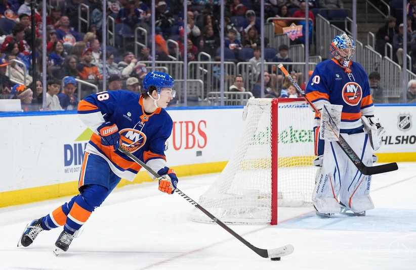Apr 12, 2026; Elmont, New York, USA; New York Islanders defenseman Matthew Schaefer (48) carries the puck against the Montreal Canadiens in the third period at UBS Arena.