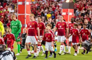 Liverpool players enter the field before their match