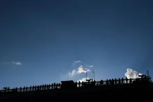 Sep 15, 2024; Watkins Glen, New York, USA; Team crew members look from the top of the main press box during the Go Bowling at The Glen at Watkins Glen International.