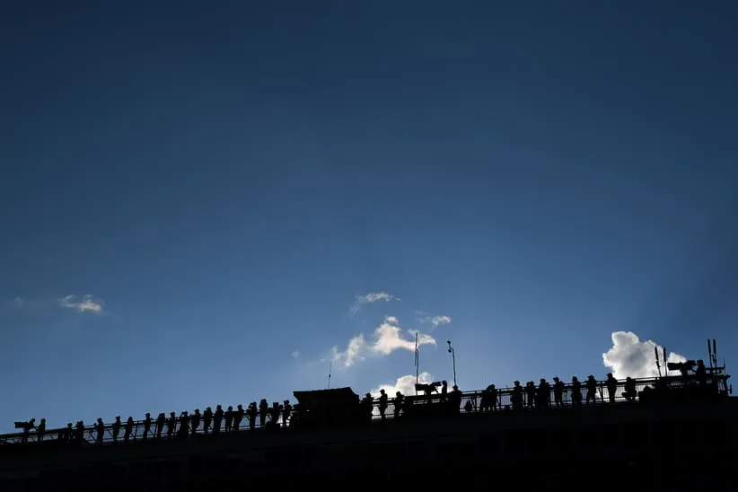 Sep 15, 2024; Watkins Glen, New York, USA; Team crew members look from the top of the main press box during the Go Bowling at The Glen at Watkins Glen International.