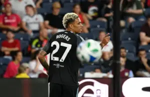 Aston Villa midfielder Morgan Rogers (27) celebrates after scoring a goal.