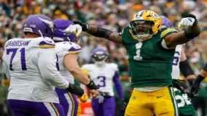 Green Bay Packers defensive end Micah Parsons (1) celebrates.