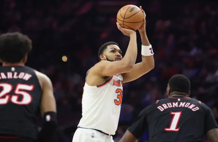 New York Knicks center Karl-Anthony Towns (32) shoots the ball.