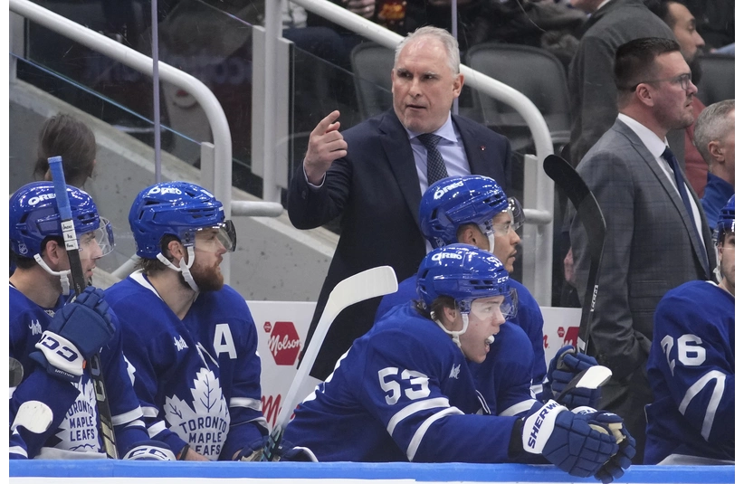 Mar 25, 2026; Toronto, Ontario, CAN; Toronto Maple Leafs head coach Craig Berube directs a player onto the ice during the third period against the New York Rangers at Scotiabank Arena. Mandatory Credit: John E. Sokolowski-Imagn Images